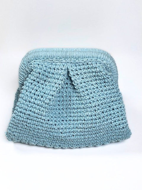 Front view of a light blue handmade raffia crocheted clutch bag