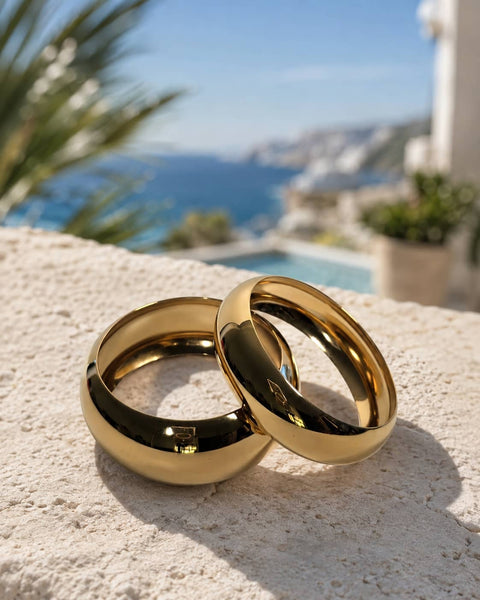 Lila polished gold bangle set with a wide and slim high shine design