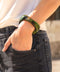 Nela green marble acrylic bangle with a modern square rounded silhouette