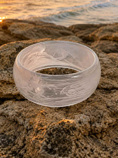 Zeni white marble acrylic bangle with a glossy wide rounded silhouette