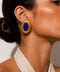 Hand made stud earrings with blue  gemstone in a vintage inspired textured gold setting.