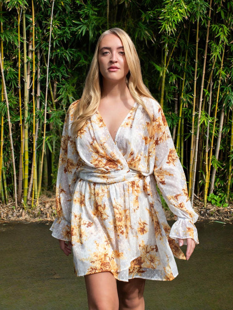 Harlow G amber spice floral mini skirt with softly draped silhouette and asymmetrical layered hem detail