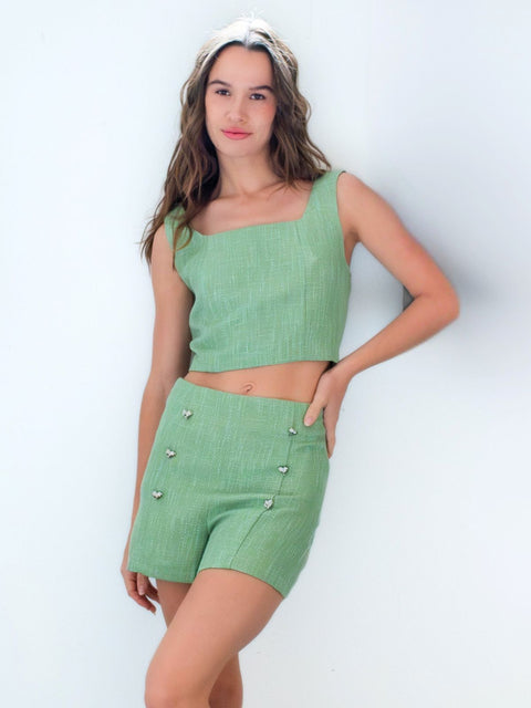 Harlow G Capri Charm Shorts in green  with heart button accents mid rise waistband and structured silhouette