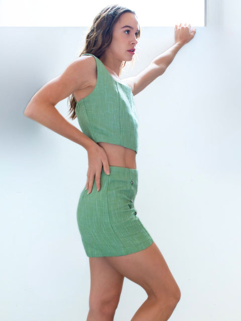 Harlow G Capri Charm Shorts in green tailored design with heart button accents paired with matching cropped top