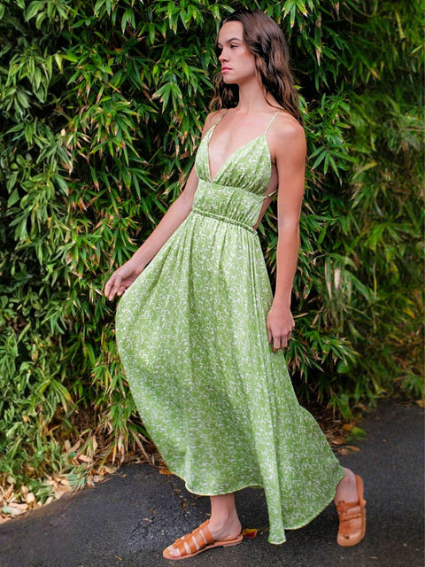 Harlow G Malaga Maxi Dress in floral green with fitted gathered waist, deep V neckline and open back design