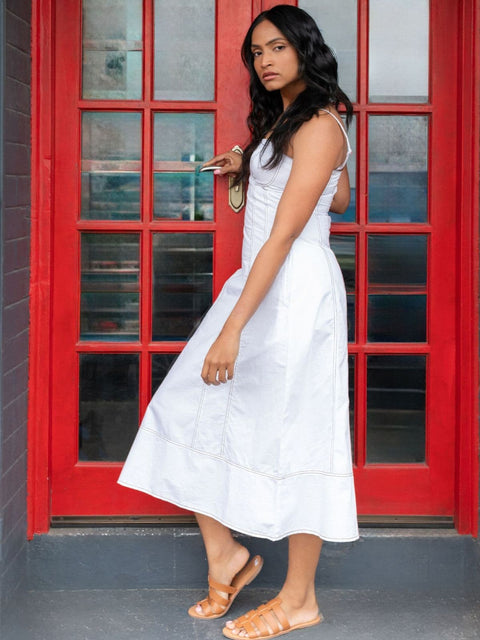Harlow G Summer Delight Dress white midi dress with thin shoulder straps side pockets and A line silhouette