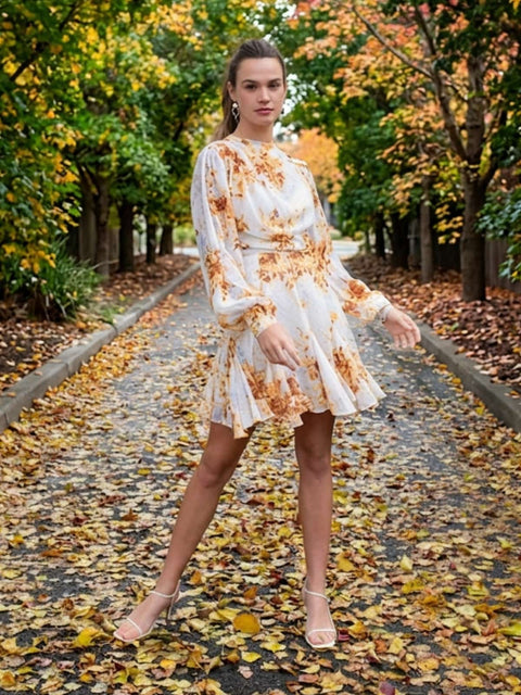 Harlow G amber spice floral mini dress with lightweight floral fabric, flared hem and relaxed feminine silhouette