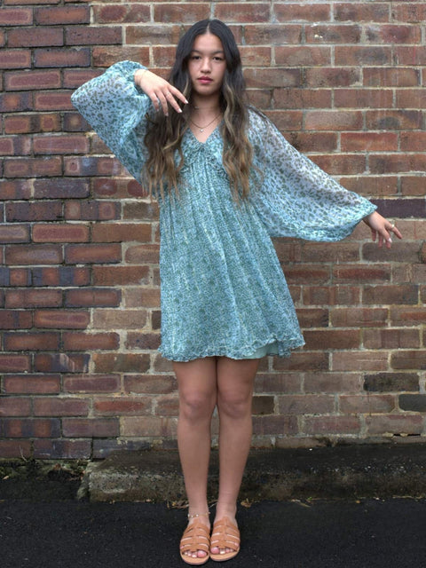 Harlow G relaxed fit Graceful Gathered Mini Dress in green with sheer balloon sleeves and flowy skirt