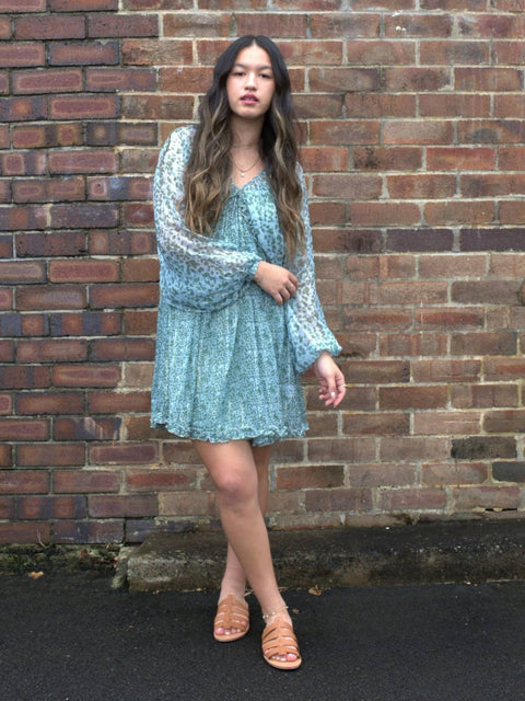 Harlow G Graceful Gathered Mini Dress in green print with voluminous sleeves and floaty gathered fit
