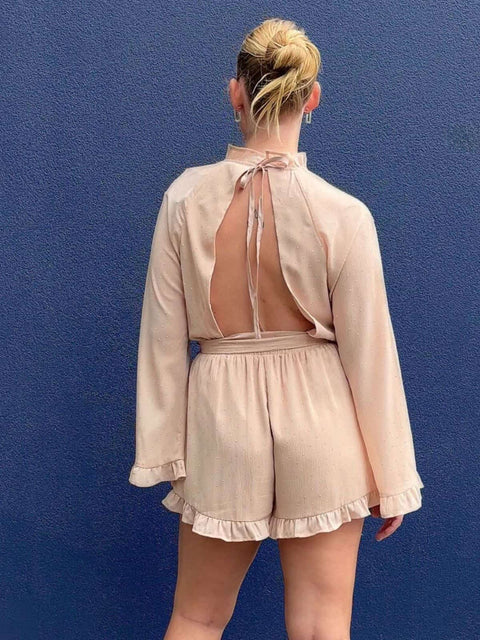 Harlow G Brooklyn Lights Playsuit pink playsuit with open back tie closure frill neckline and relaxed silhouette