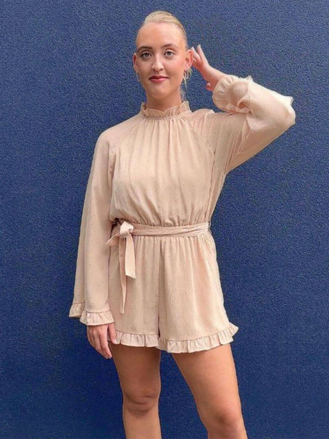 Harlow G Brooklyn Lights Playsuit pink playsuit with long sleeves frill cuffs and gathered neckline detail