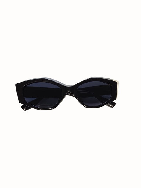 1. Black wide frame sunglasses with angular silhouette and dark tinted lenses