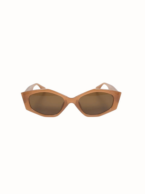 Caramel cat eye sunglasses featuring semi transparent frames and warm brown lenses
